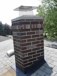 new brick chimney with chimney cap