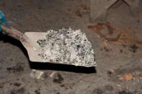 shovel removing ash - Indianapolis IN - Your Chimney Sweep